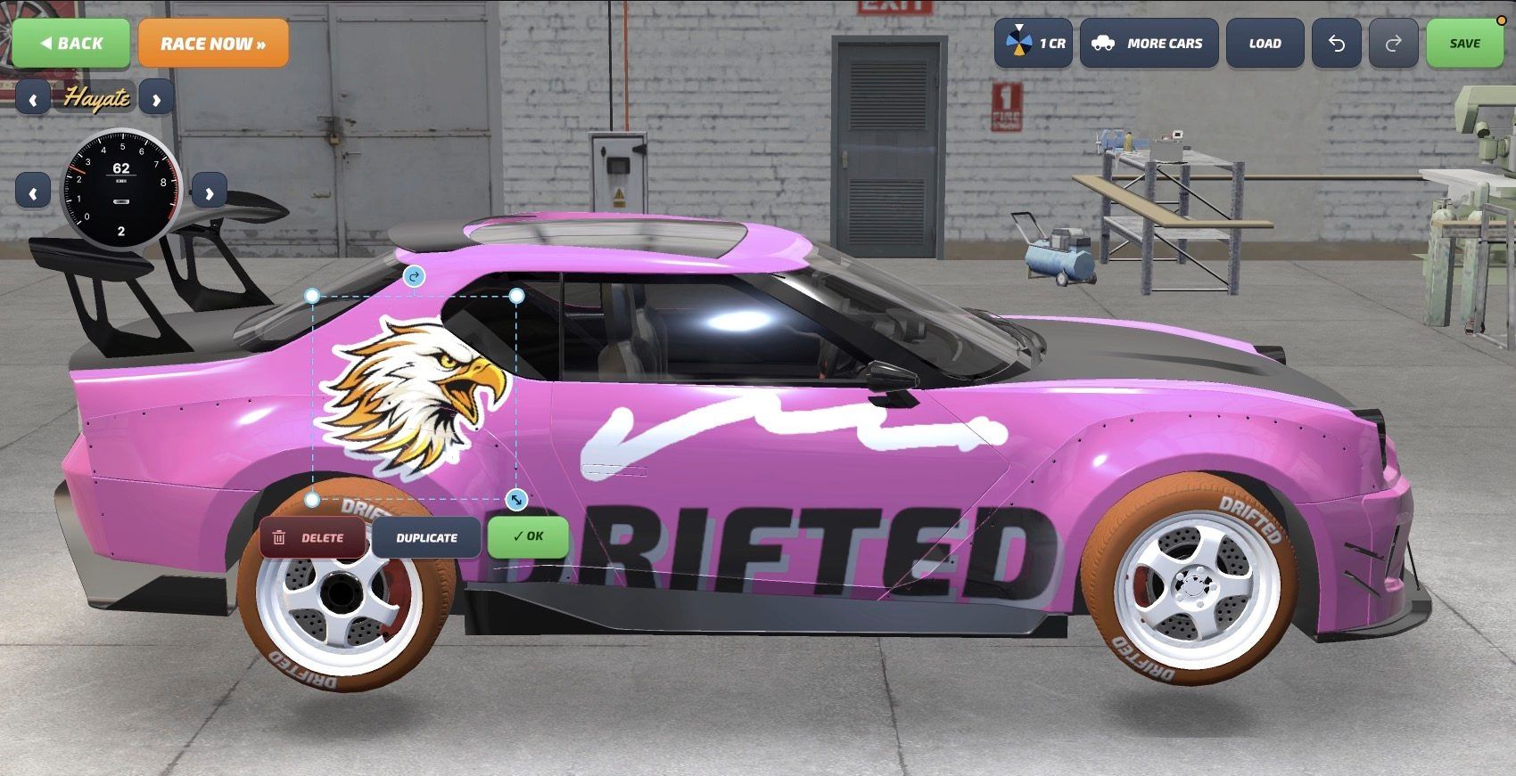 The garage editor placing an eagle sticker on a pink drift car